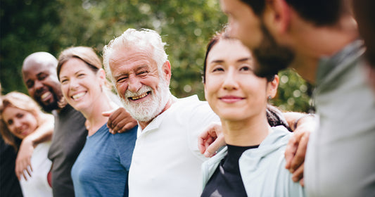 Diverse group of people smiling - Innovations in incontinence products
