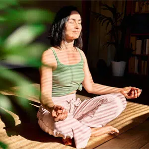 Woman practicing meditation - Incontinence Management